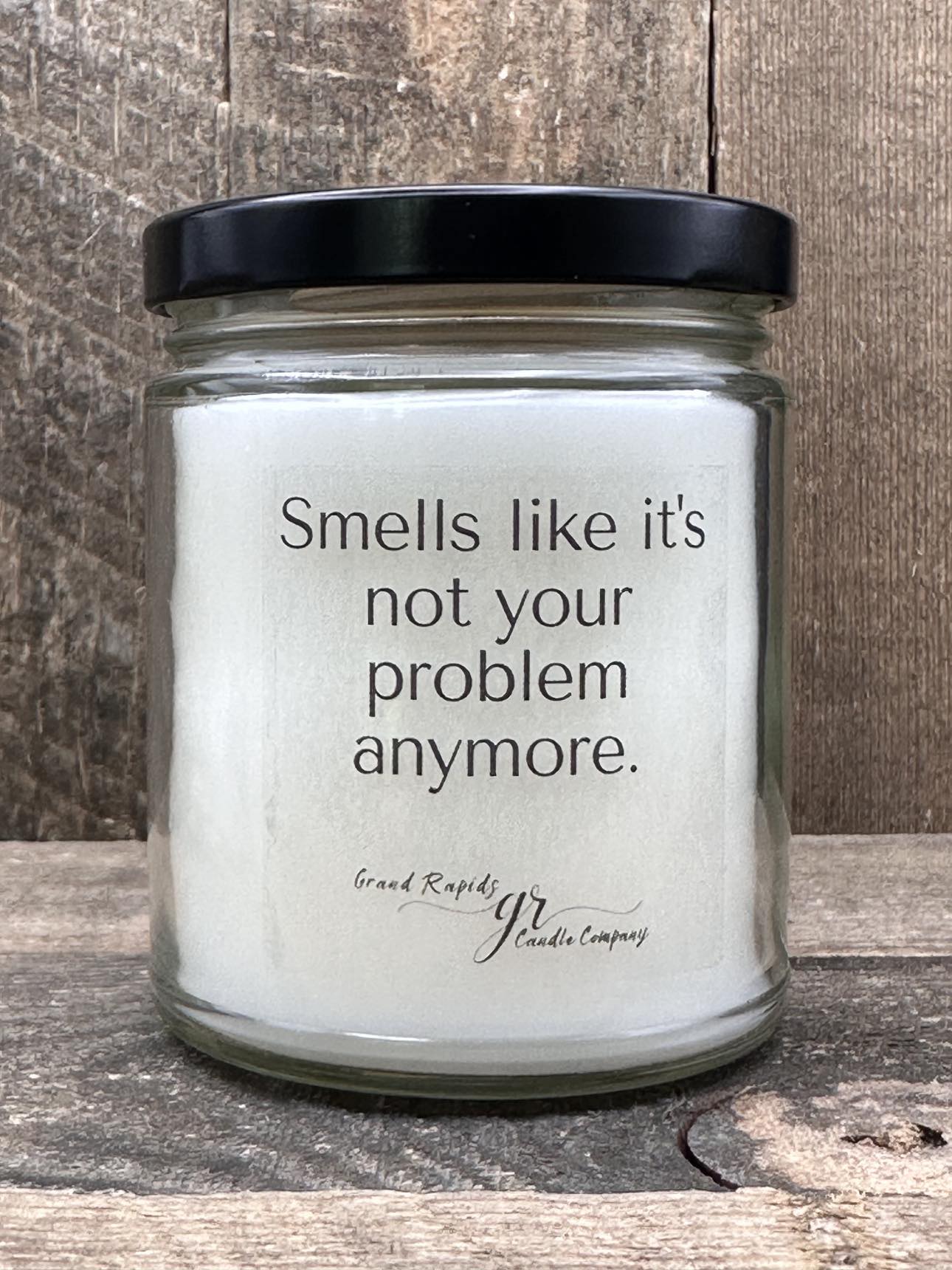 Smells like it's not your problem anymore. 9oz Soy Blend Candle